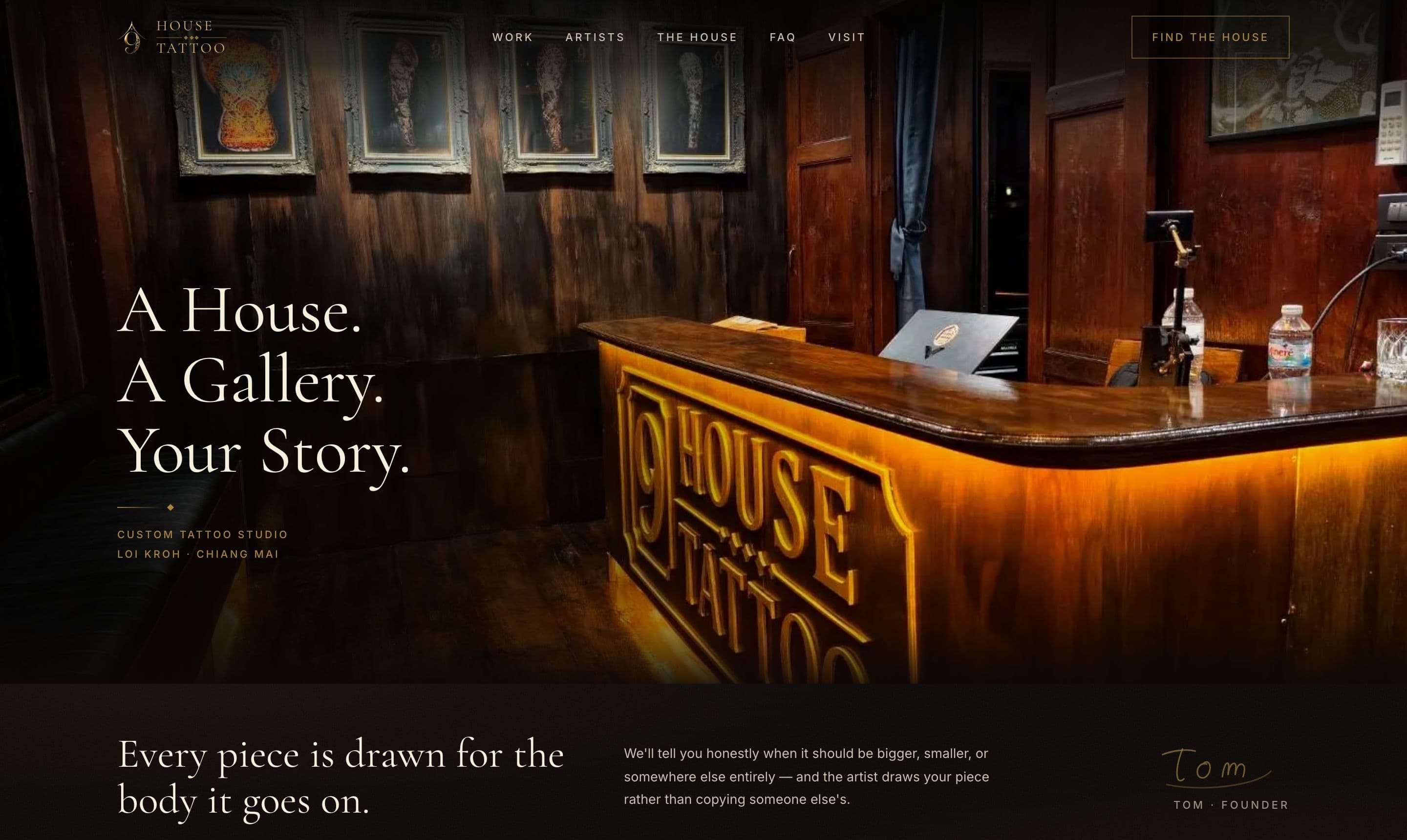 Homepage of 9house.tattoo: the headline “A House. A Gallery. Your Story.” over the studio’s lit timber reception desk carved with the 9 House emblem.